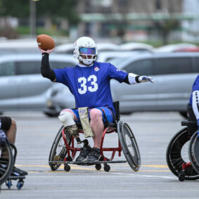 Buffalo #33 David Cross - USA Wheelchair Football Tournament for Move United outside Arrowhead Stadium.
(Photo by Reed Hoffmann on 10/29/21)

NIKON D780, Manual, SUNNY white balance, ISO 1000, 1/1250 at f/4 in multi-segment metering, +0.3 EV, Nikkor VR 200-400mm f/4G lens at 400mm. Photo copyright Reed Hoffmann.